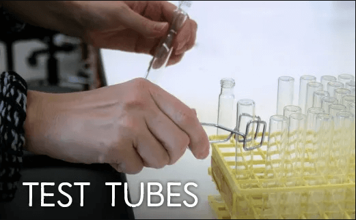 Test tubes, tongs, and racks